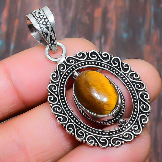 Glimmering Guardian – Tiger’s Eye Sterling Silver Pendant